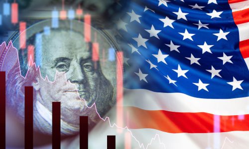 US financial market. Concept - government bonds of America. Flag of the United States of America. Franklin Partret next to the falling charts. Collapse of the economy. Crisis. Recession